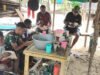 Suasana Kehangatan Saat Satgas TMMD ke-128 Nikmati Makan Siang Bersama
