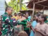 Satgas TMMD Berbagi Kebahagiaan Bersama Anak-Anak di Kampung Keakwa